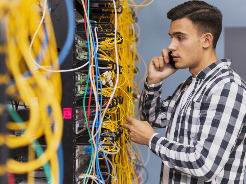 young-network-engineer-talking-phone
